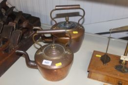 Two brass and copper kettles