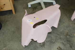 An Eames style children's stool in the form of an