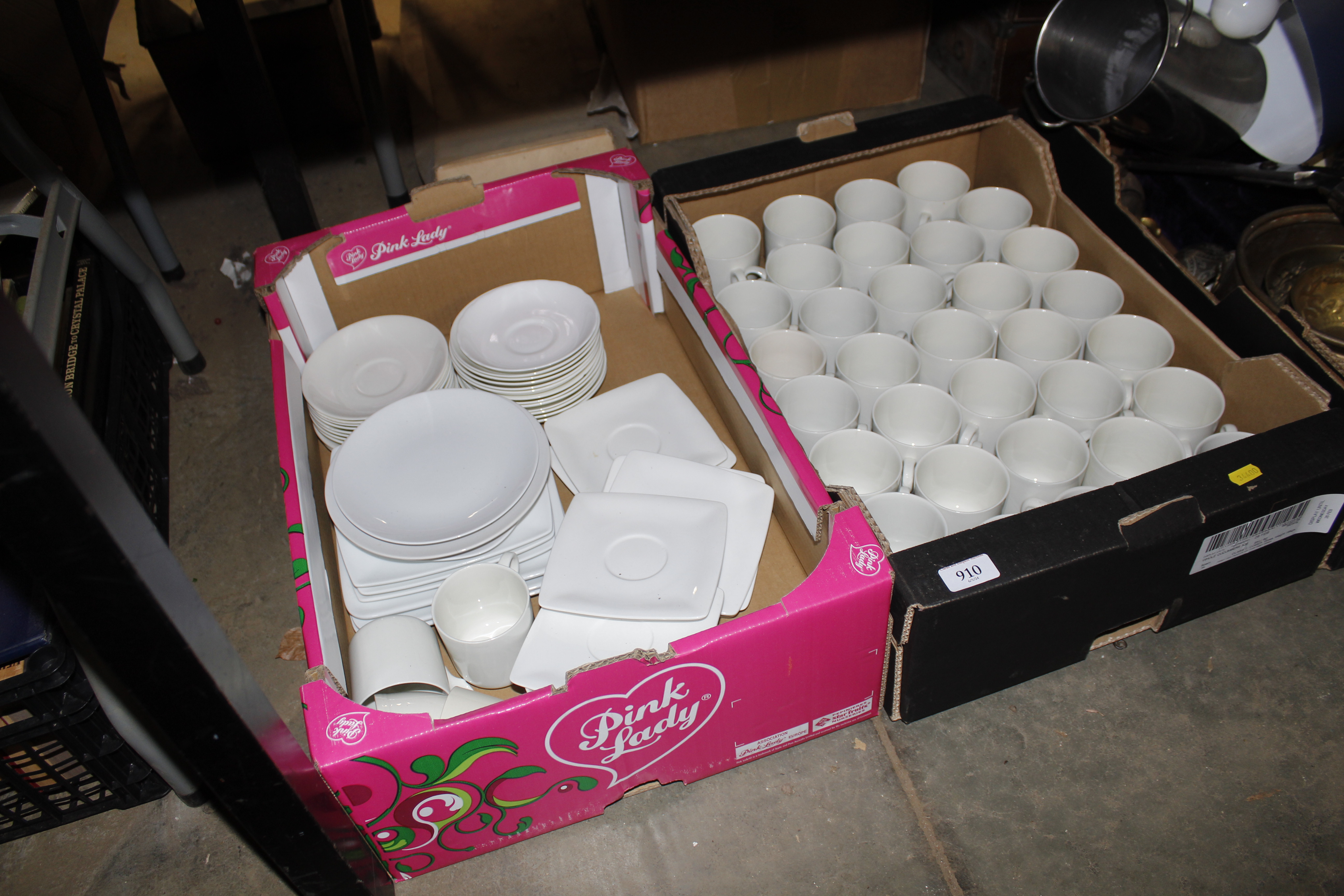 Two boxes of white glazed tea ware