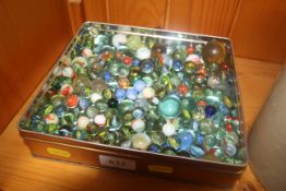 A tin of vintage glass and other marbles