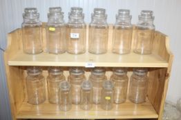 A collection of glass storage jars