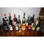 A collection of alcohol to include wine, brandy et