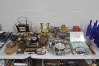 A collection of various wooden and metal items to