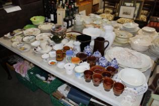 A large collection of various patterned tea and di