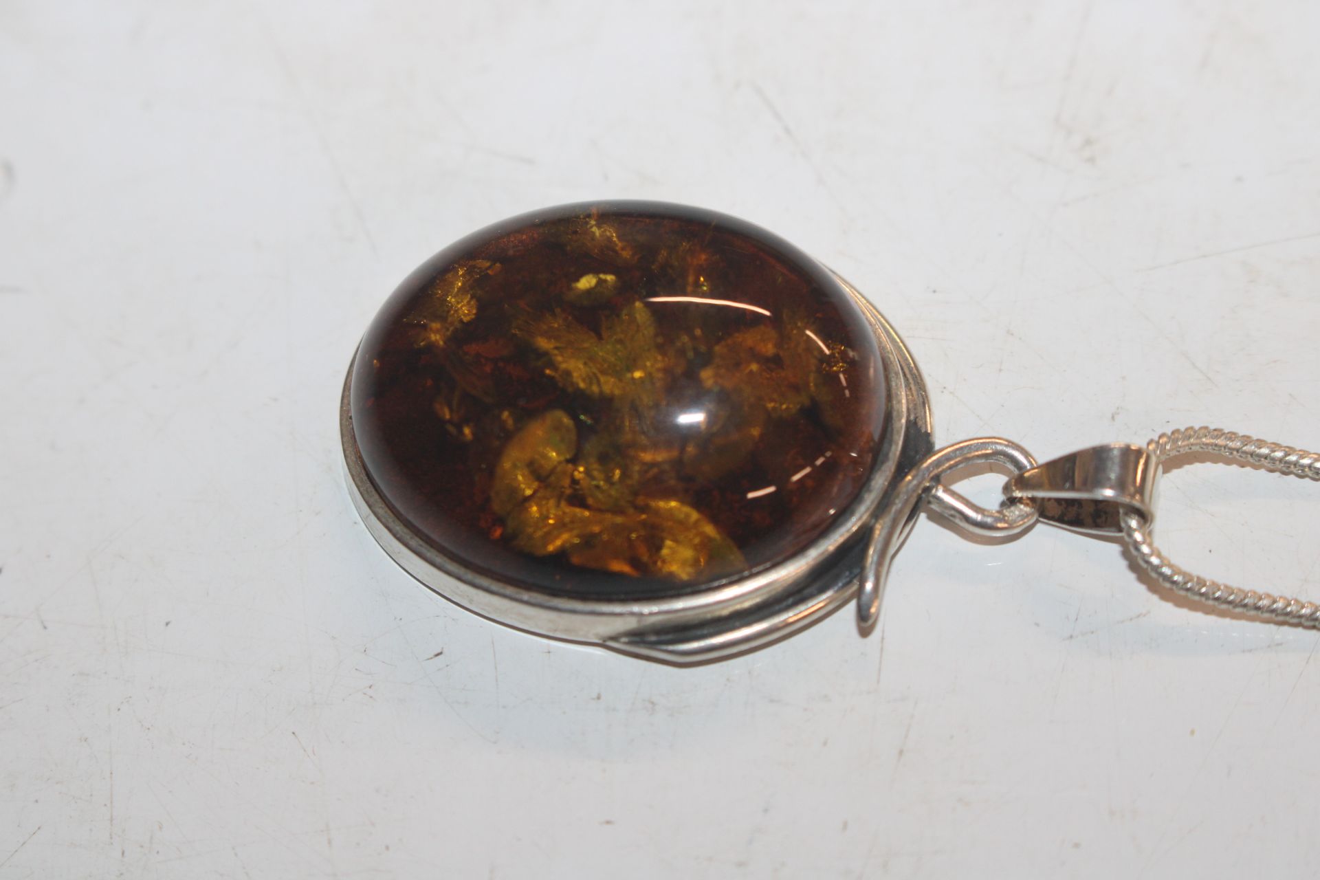 A large Sterling silver and amber pendant on chain - Image 2 of 7