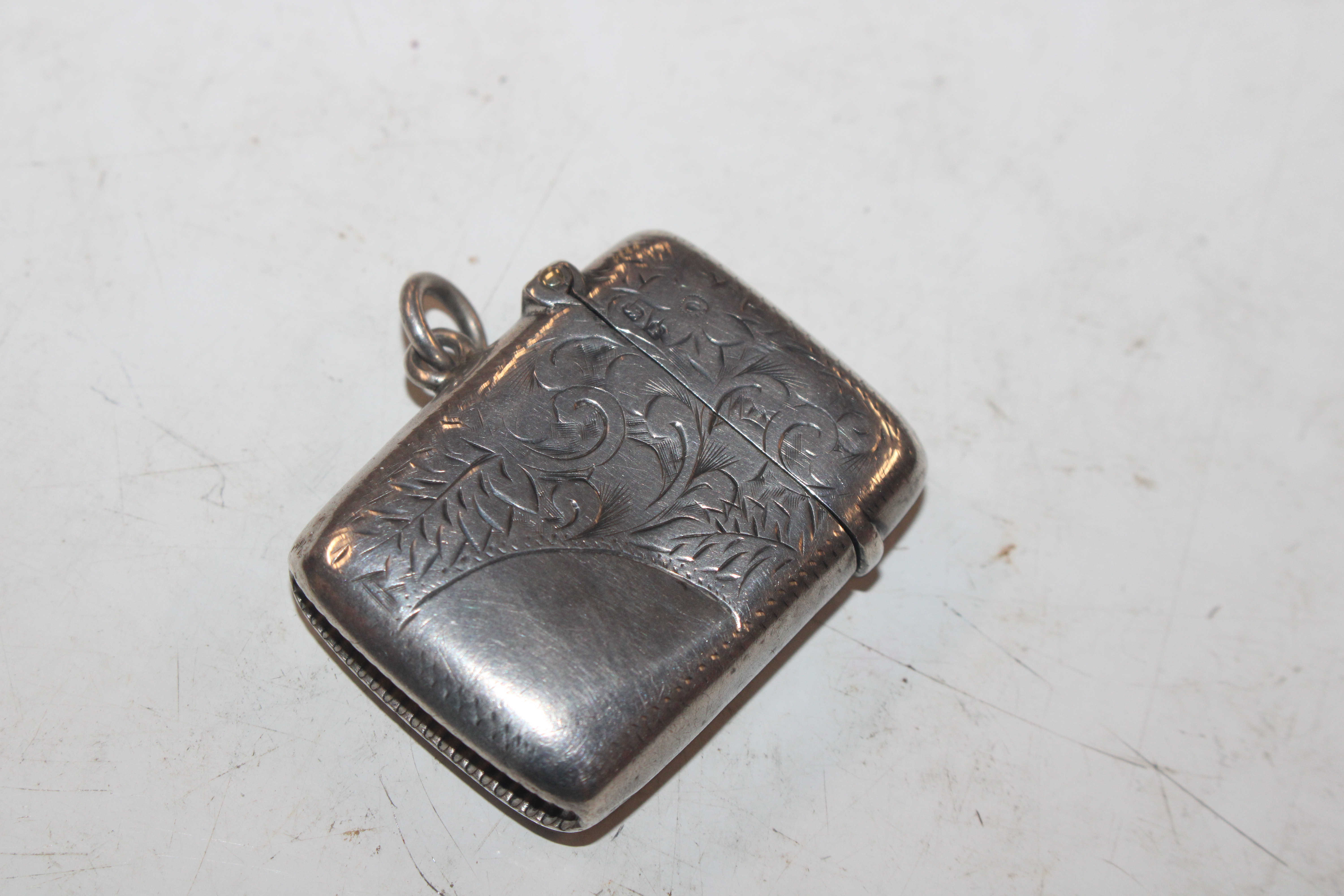 A silver vesta case; a silver stamp case; a silver - Image 8 of 22