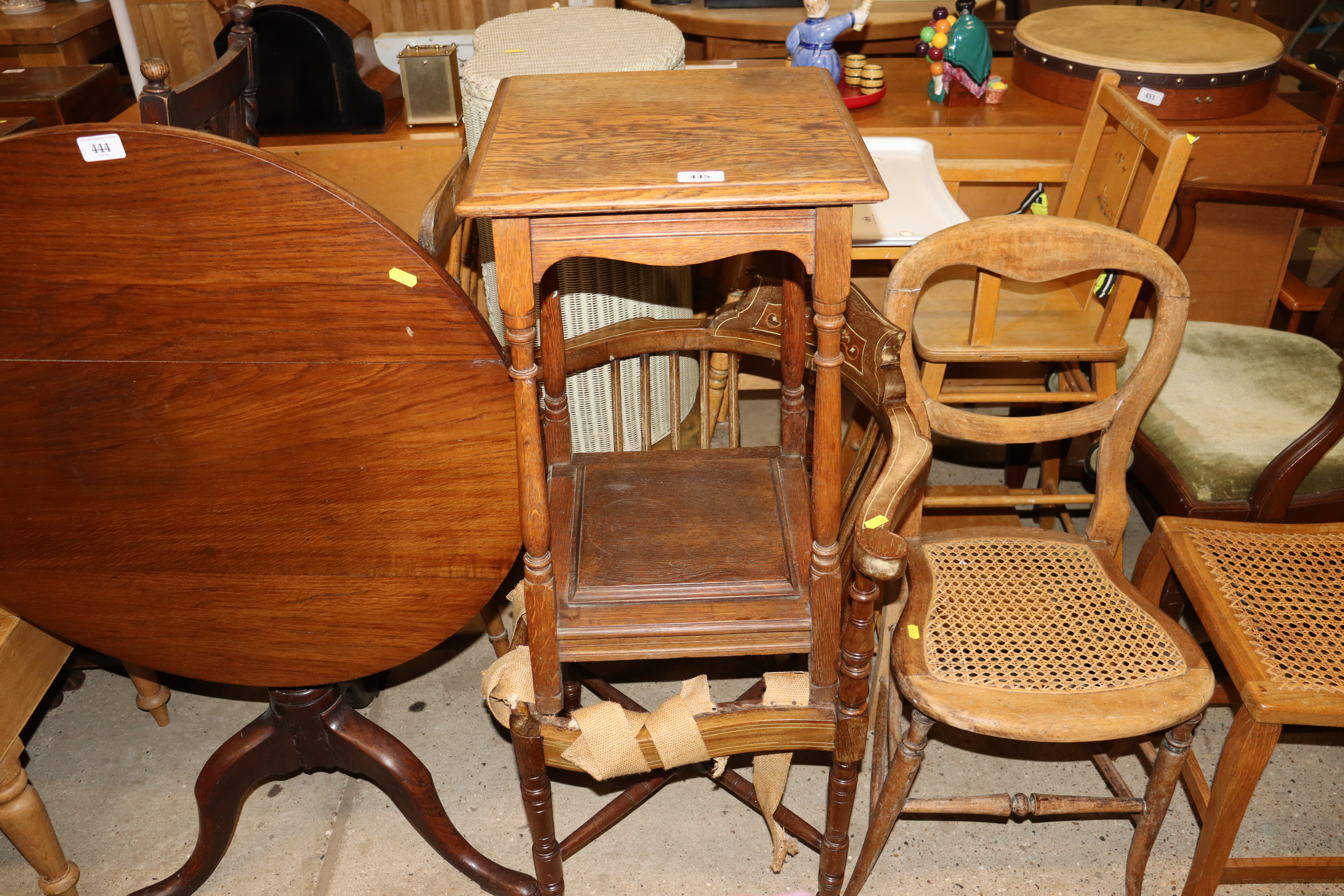 An Edwardian corner chair and an oak side table