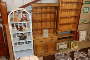 A small stripped pine dresser