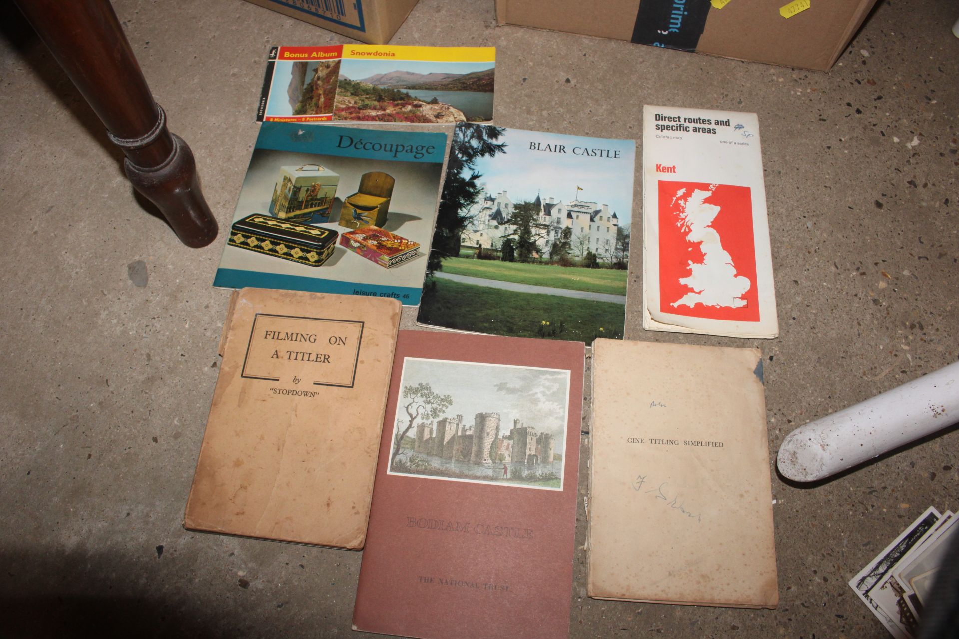 Two boxes of various books to include antique Bibles, postcards, Imperial Quill tin - Image 5 of 30