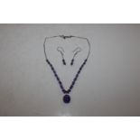 A Sterling silver amethyst set necklace and earrings, approx. 21gms total weight