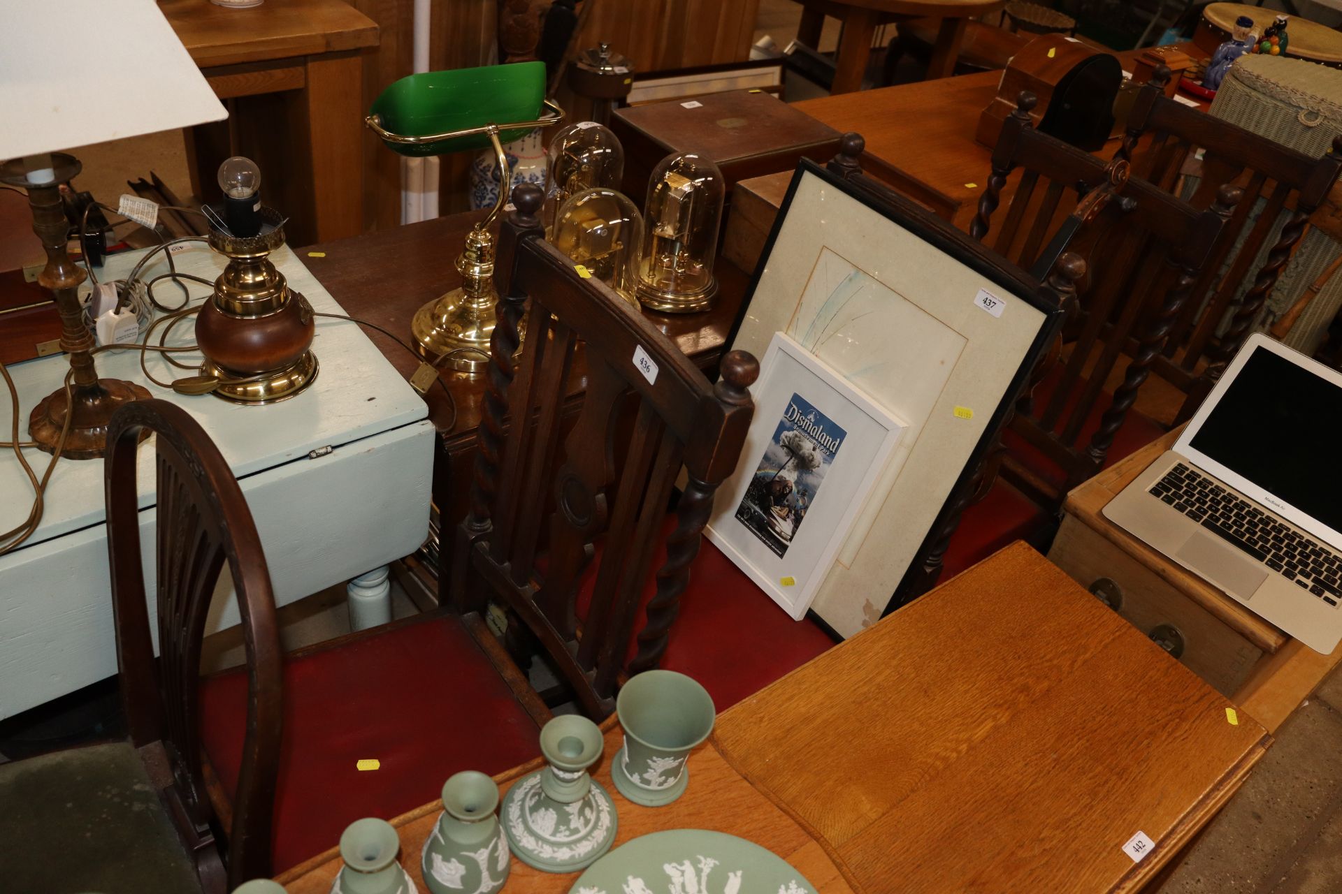 A set of four oak barley twist dining chairs (one