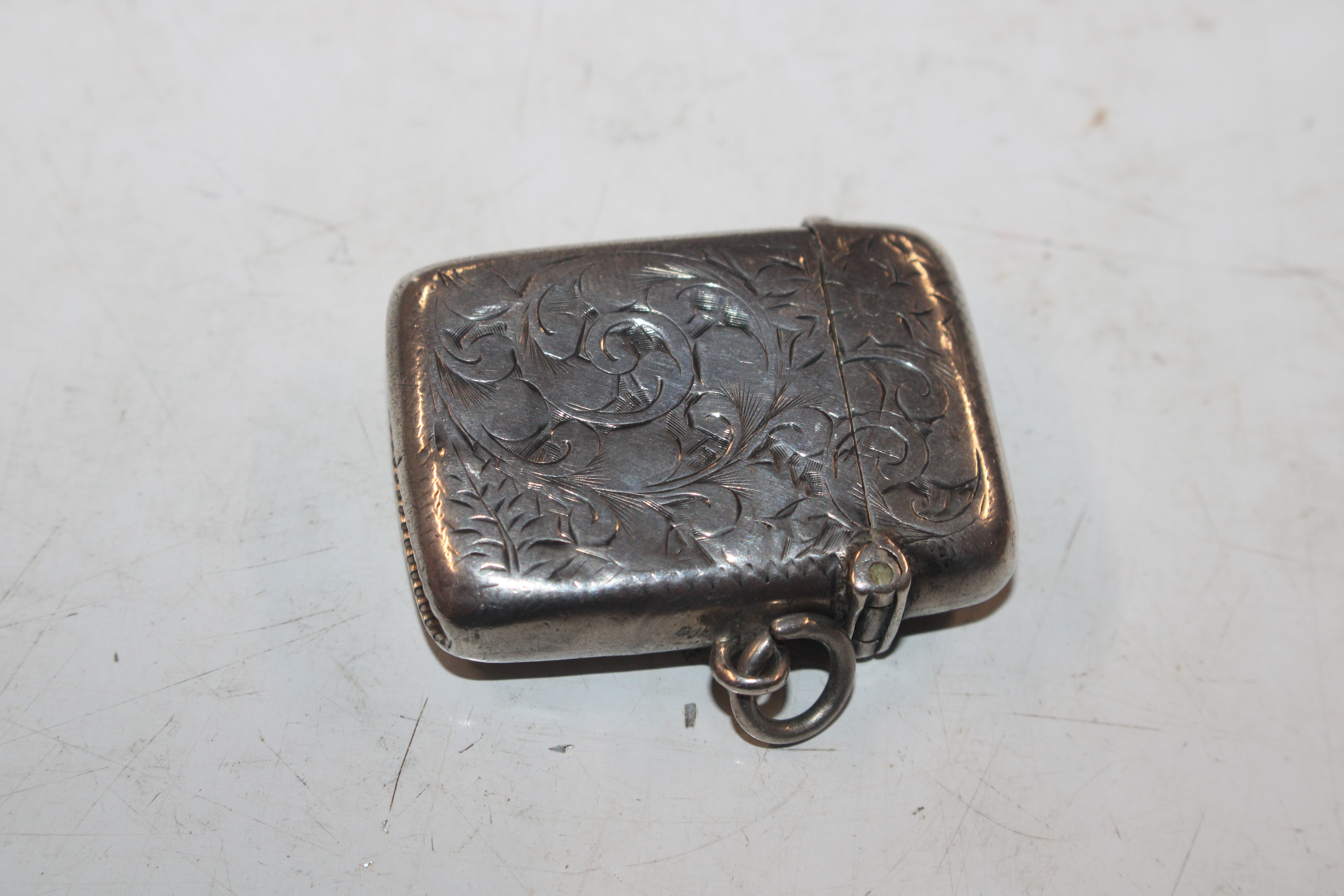 A silver vesta case; a silver stamp case; a silver - Image 9 of 22