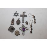 A box of silver and white metal jewellery to include pendants and earrings