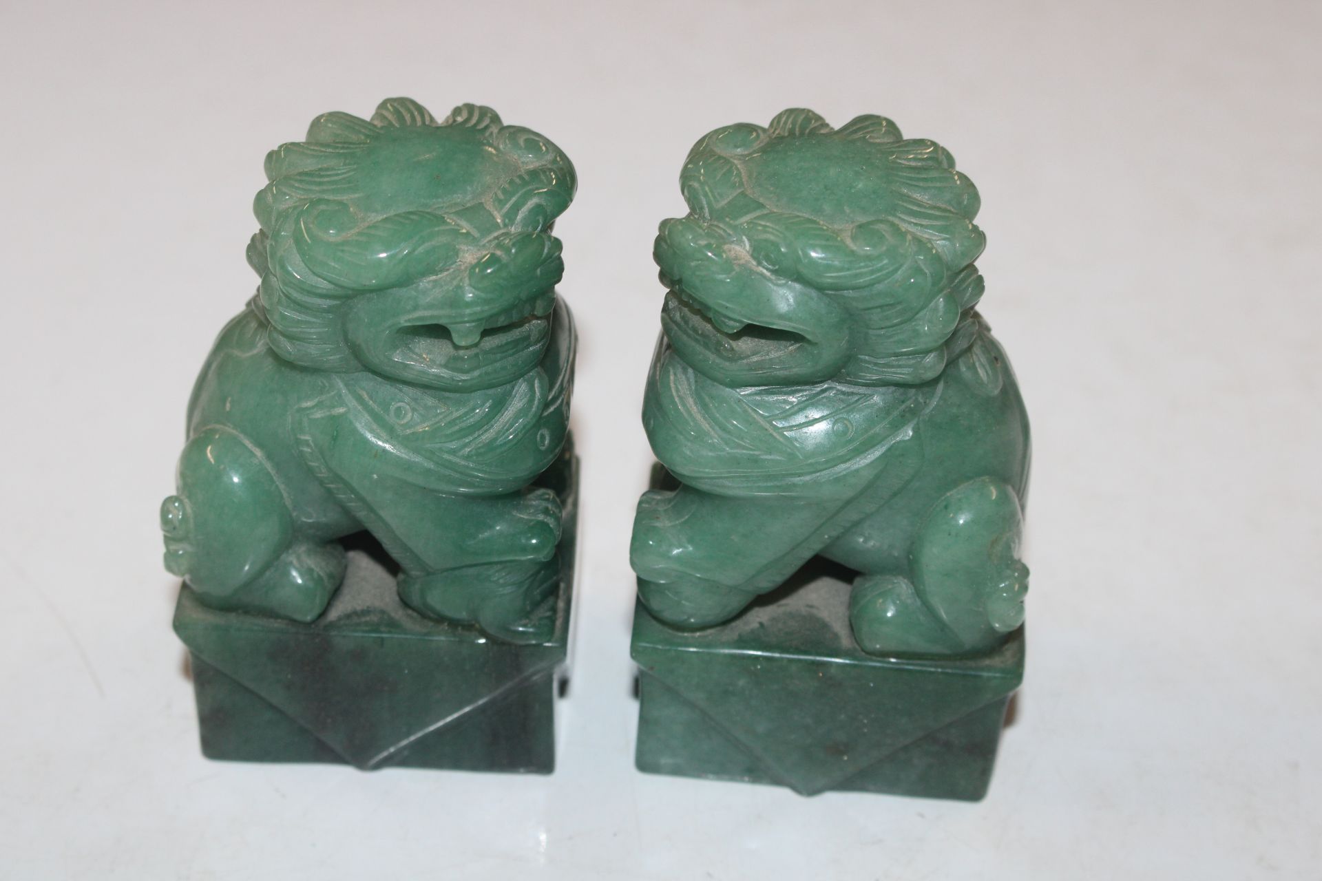 Two carved jade coloured stone Temple Dogs - Image 2 of 4