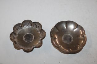 Two Sterling silver dishes, both inset with coins