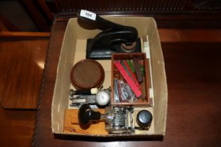 A box containing vintage stationery items to inclu
