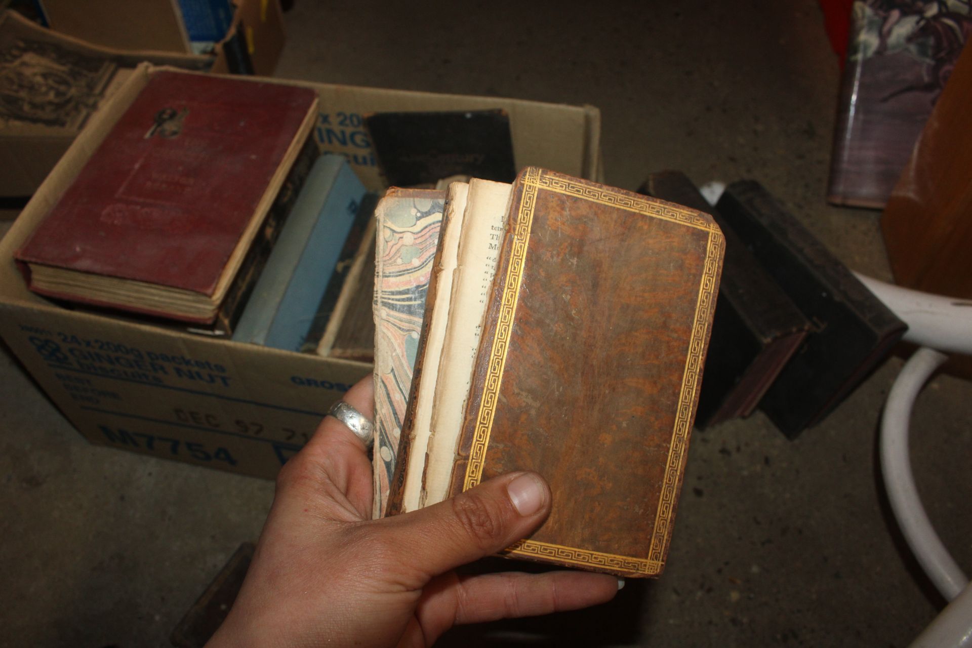 Two boxes of various books to include antique Bibles, postcards, Imperial Quill tin - Image 25 of 30