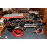 A spirit fired model of a traction engine, approx. 50cm long x 27cm high