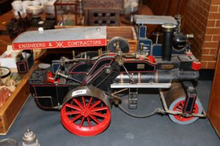 A spirit fired model of a traction engine, approx. 50cm long x 27cm high