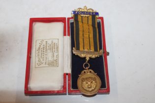 A 9ct gold Masonic medal, approx. 10gms together w