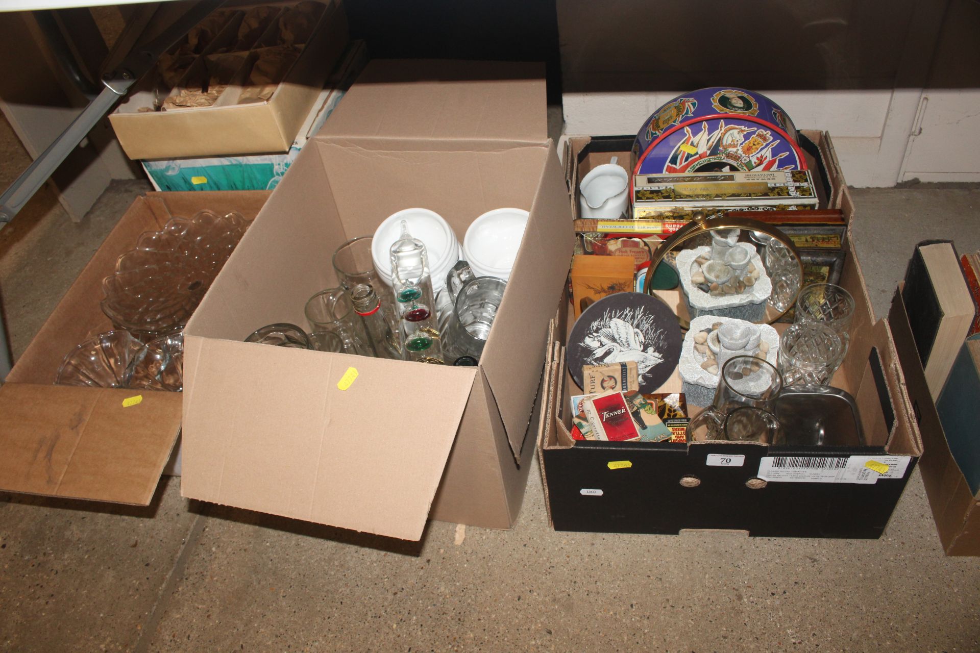 A quantity of vintage tins, packaging and other ad