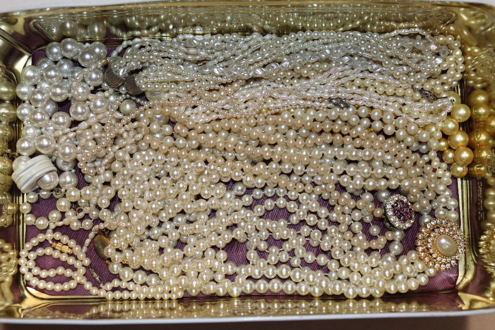 A box of assorted simulated pearl necklaces