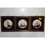 Three framed silhouettes on glass depicting sailin