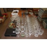 A large quantity of various table glassware, steak