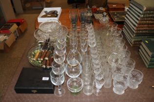 A large quantity of various table glassware, steak