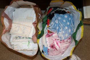 Two bags of linen and various scarves