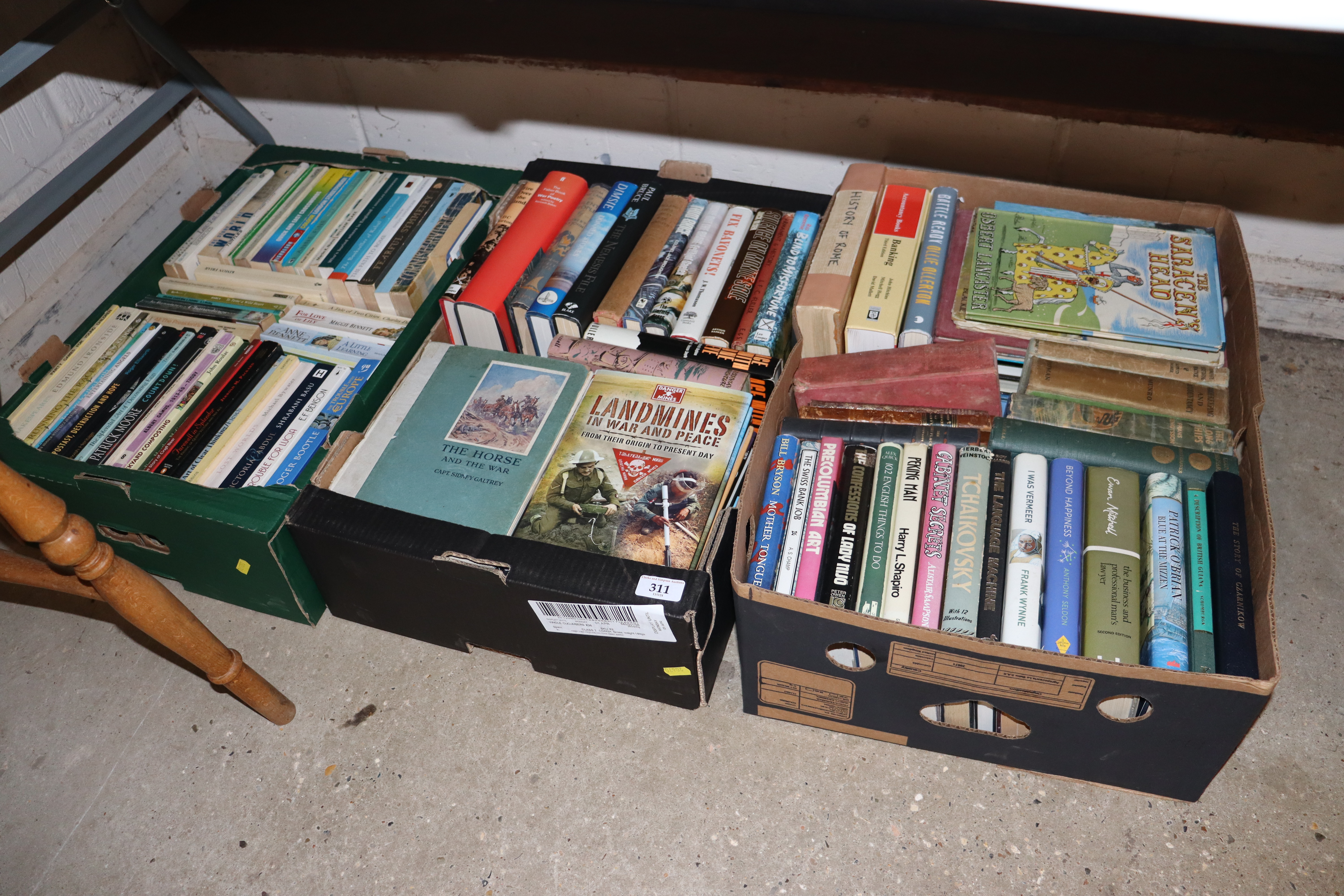 Three boxes containing various books including art