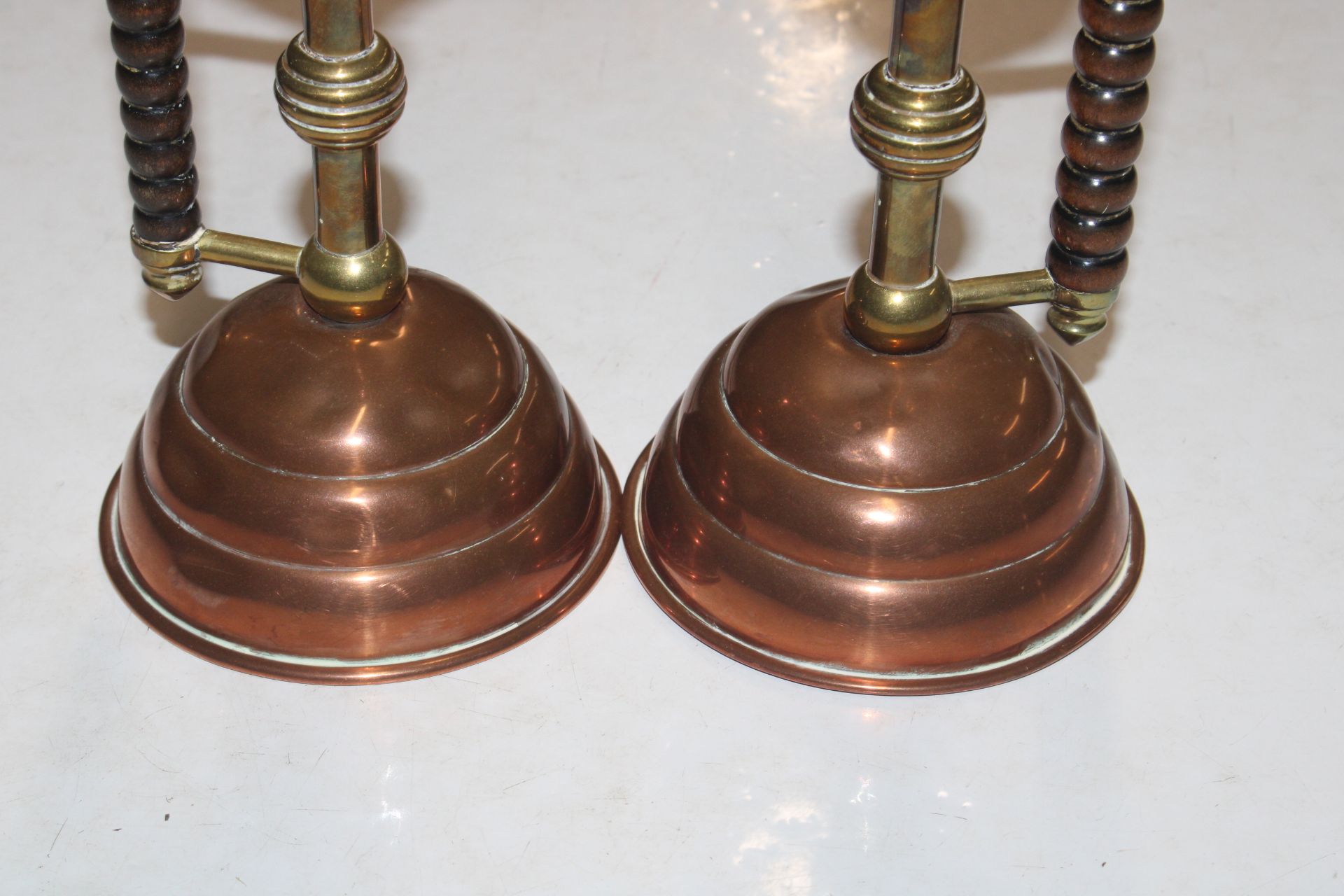 A pair of late Victorian brass and copper candlest - Image 2 of 9