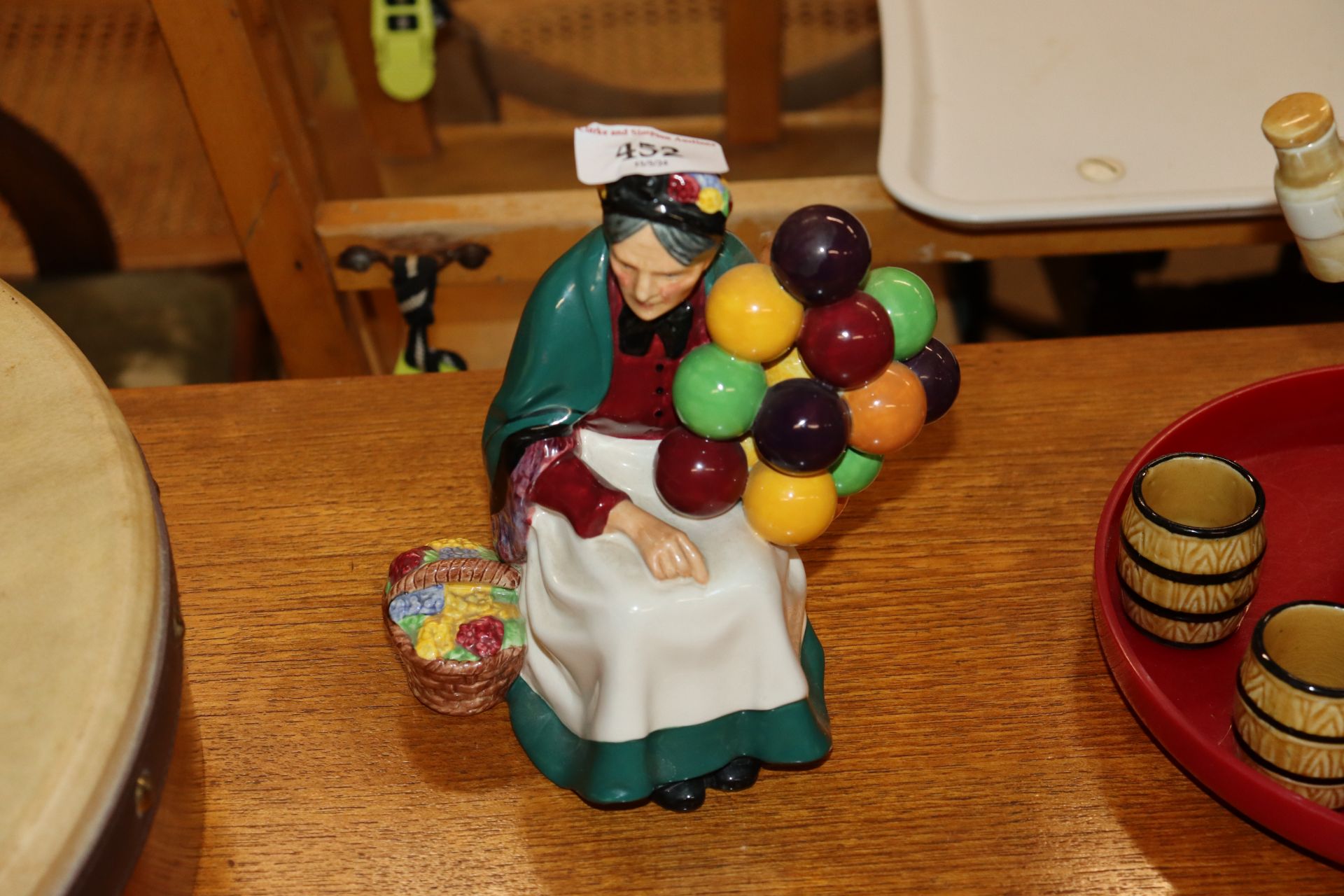 A Royal Doulton figure "The Old Balloon Seller" HN