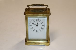 A brass cased carriage clock