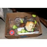 A box containing various glassware and artificial