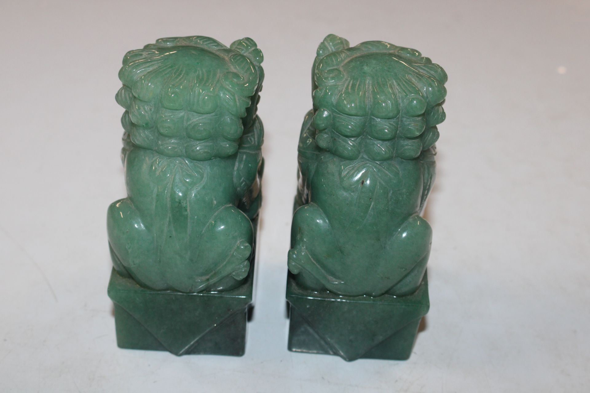 Two carved jade coloured stone Temple Dogs - Image 3 of 4