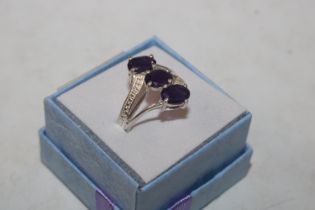 A Sterling silver and amethyst set ring, ring size L/M