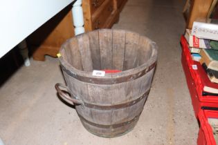 An oak and coopered twin handled log basket