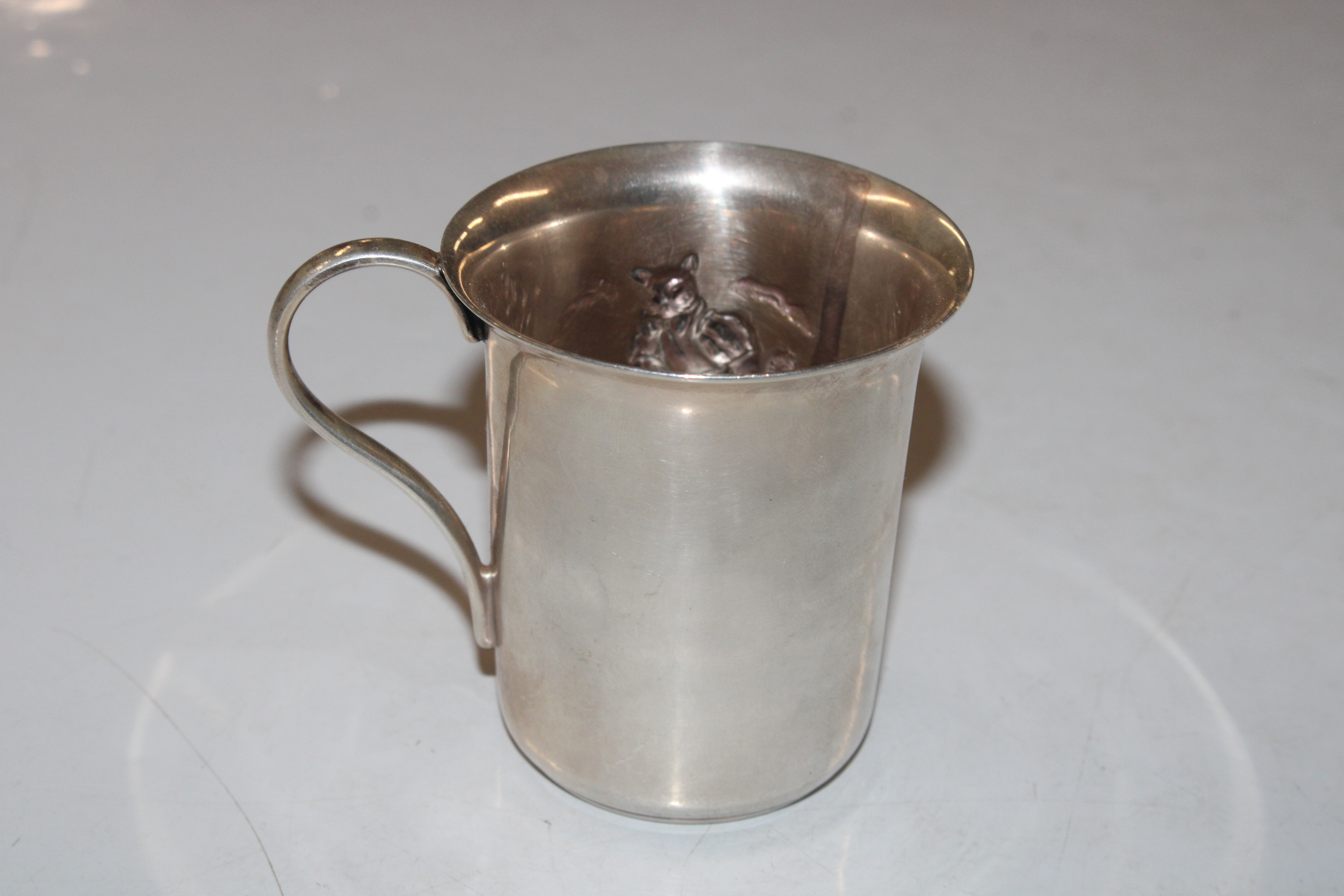 A white metal cup decorated with Puss In Boots, ap - Image 3 of 4