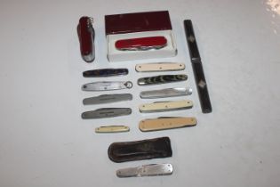 A mother of pearl mounted knife and fork; a collec