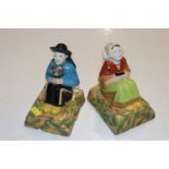 A pair of French porcelain book ends in the form o