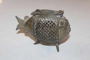 An incense or pot pourrie holder in the form of a