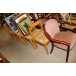A pink upholstered armchair and a set of four Vico