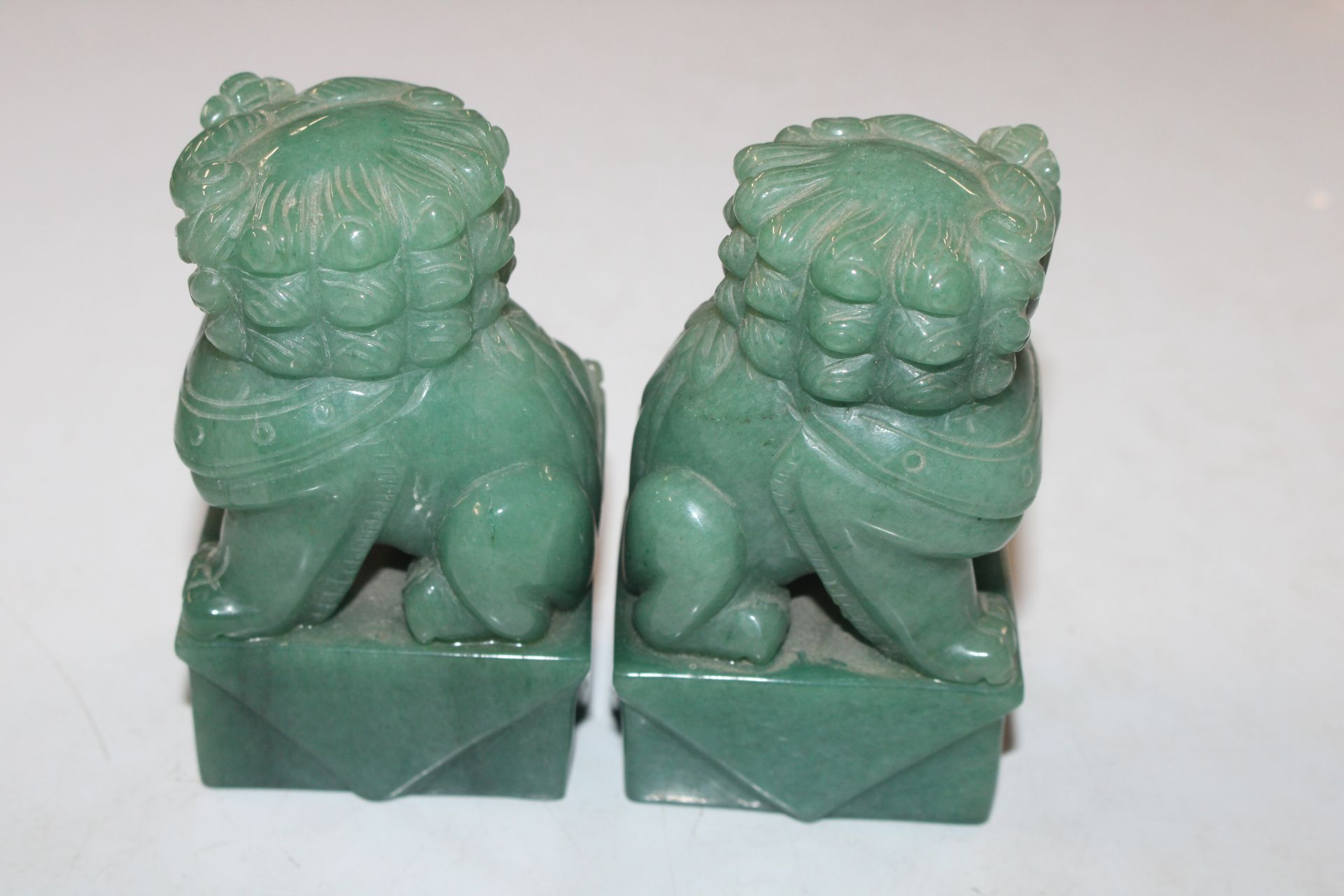 Two carved jade coloured stone Temple Dogs - Image 4 of 4