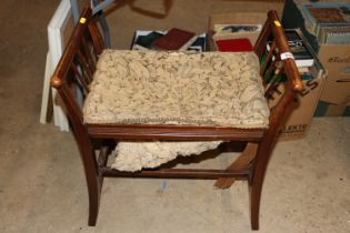 A mahogany upholstered dressing table stool