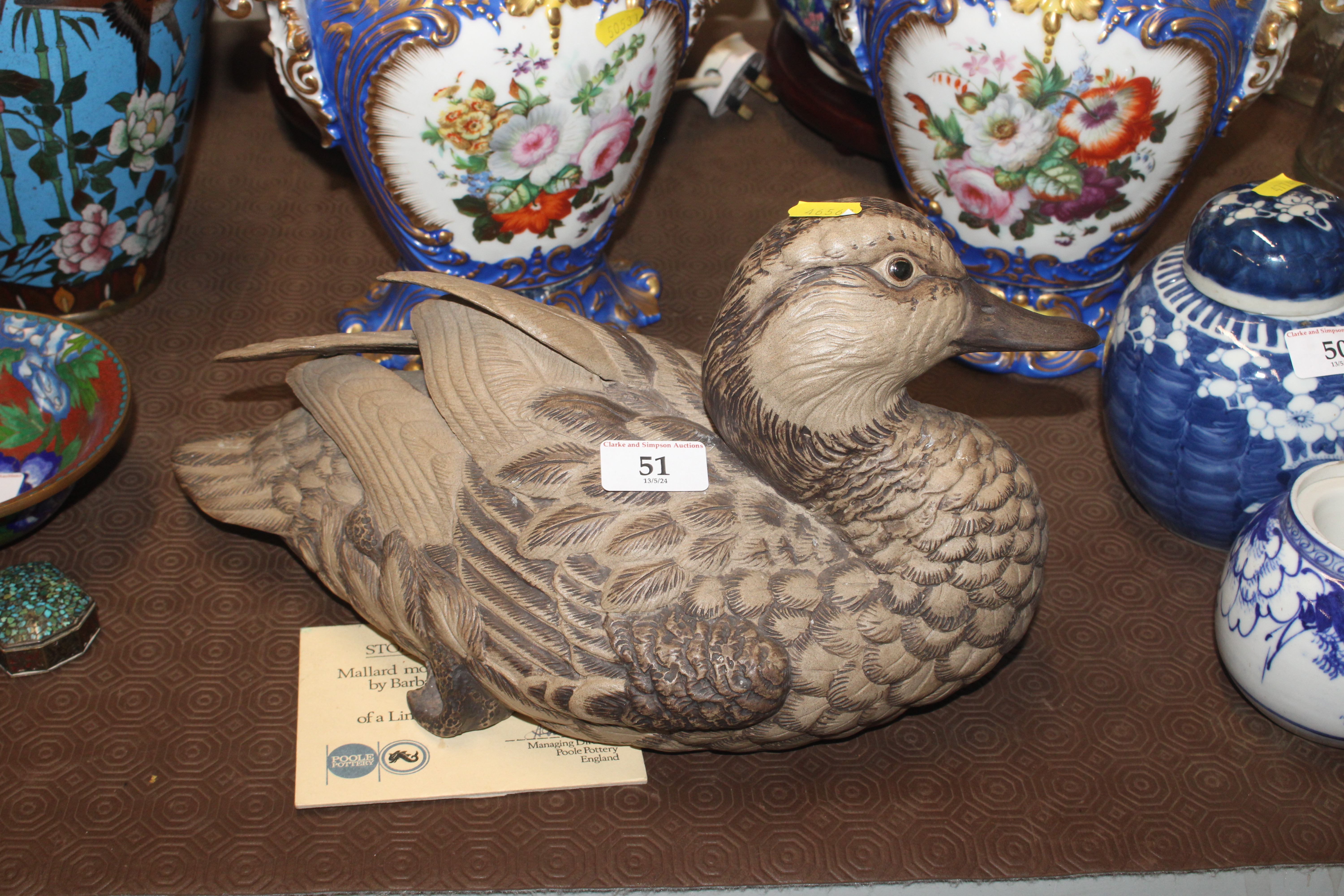 A stoneware figure of a mallard modelled and sculp