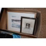 A box of various pictures and prints