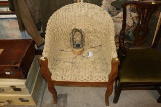 A rope work tub shaped armchair