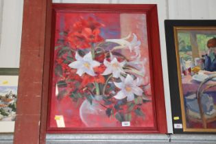 A framed and glazed pastel study of lilies, signed