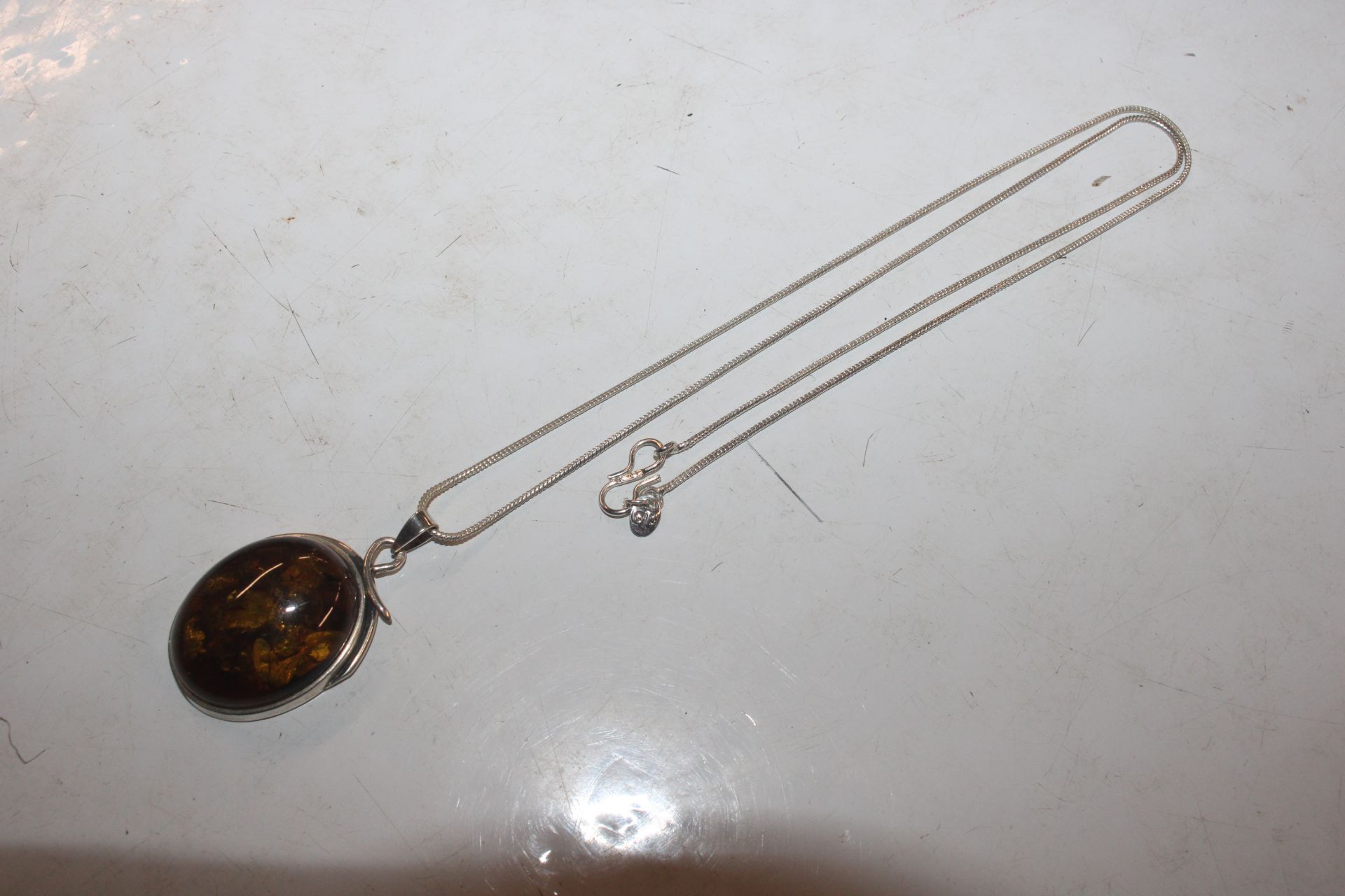 A large Sterling silver and amber pendant on chain - Image 3 of 7